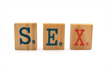 word sex in wood isolated on white background