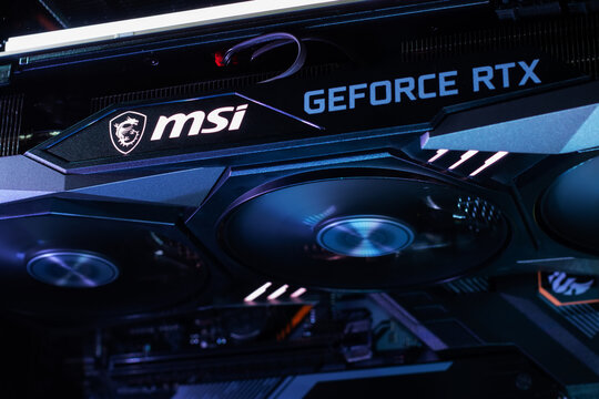 Dnipro, Ukraine - February 23, 2023: MSI Geforce RTX gaming graphics card in a open case with glow
