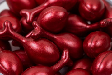 face care oil capsules on white background. single use nourishing oil for dry and damaged skin. Anti-aging cosmetics.