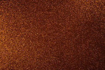 bronze shining glitter background. party concept. shimmering surface. New year, birthday. glowing...