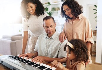Family, keyboard piano and playing music with grandparents, mother and child with people bonding. Happiness, relationship and generations, teaching and learning, creativity and musical instrument