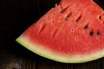 Fototapeta na wymiar Sliced ripe and juicy watermelon of red color