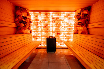 Relaxation Center with Sauna, Hammam, and Jacuzzi in a wooden, orange environment - obrazy, fototapety, plakaty