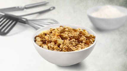 Oat flakes in the bowl. Tasty morning dish