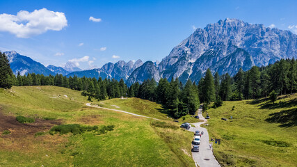 Fototapeta na wymiar Along the mountainous roads of the Val Dogna to the slopes of the Montasio. Friuli.
