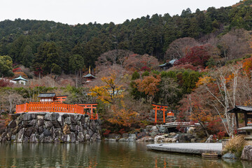 日本　大阪府箕面市にある勝尾寺の弁天堂と多宝塔と紅葉した木々