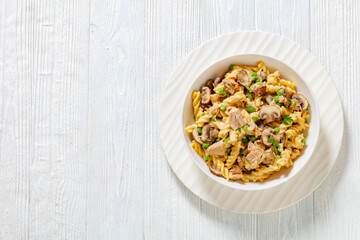 tuna mushroom green pea fusilli with sauce
