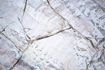 Background Stone wall background with abstract spots. Beautiful gray marble texture with stains, abstract surface background. Finishing stone for building cladding. Furniture granite.