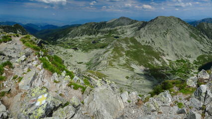 Panorama above the high summits of Retezat Mountains and the glacier lakes and cauldrons beneath...