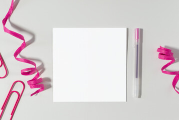 Greeting card mockup on desk top-down view