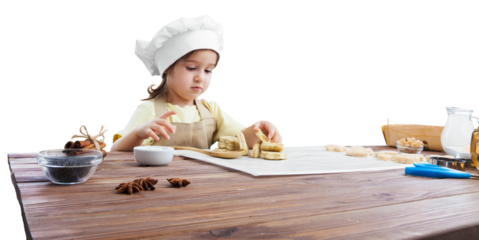 The beautiful young mother and her little daughter cooking