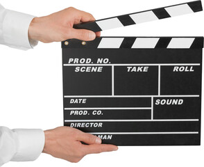 Human hand holds movie clapper board