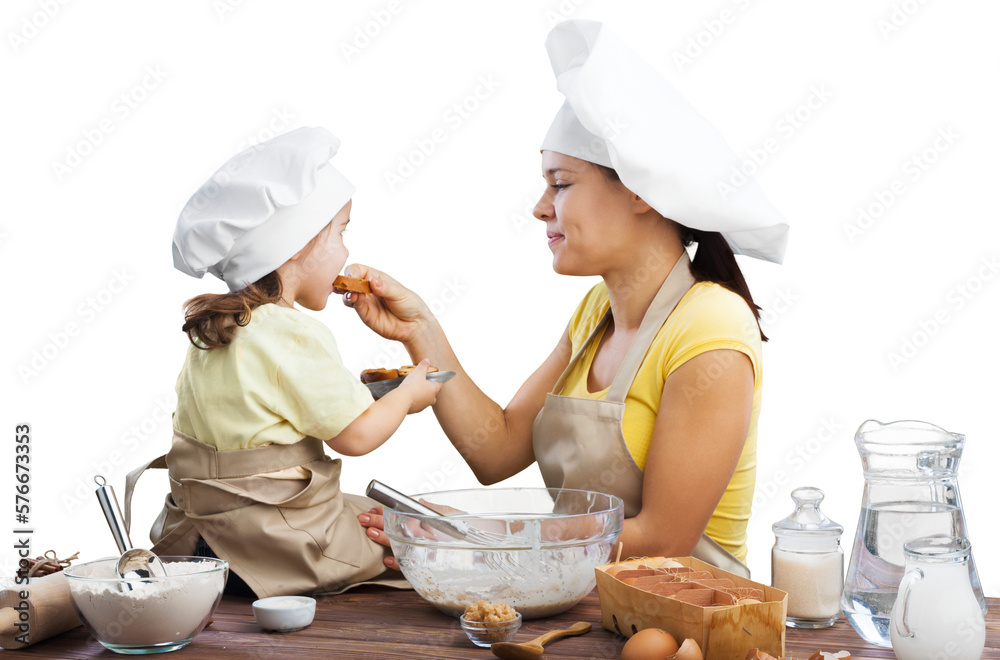 Canvas Prints The beautiful young mother and her little daughter cooking