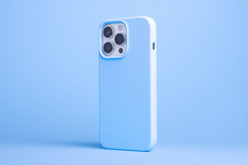 iPhone 14 and 13 Pro Max in light blue case back side view isolated on blue background, monochrome...