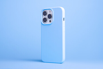 iPhone 14 and 13 Pro Max in light blue case back side view isolated on blue background, monochrome color phone cover mock up
