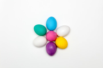 Decorated Easter eggs in the form of a flower on a white background