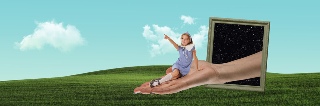 Contemporary art collage. Little cute girl, child sitting on hand appearing from space frame and looking on green field. Childhood, fun, fantasy, dreams, imagination and inspiration. Creative design