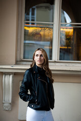 Fototapeta premium Woman wearing casual clothes walking on the street