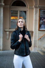 Fototapeta premium Woman wearing casual clothes walking on the street