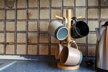 Kitchen utensils and ceramic tea mugs