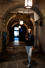 Portrait of beautiful woman in the evening with city light