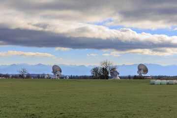 Parabolic antennas of the satellite communication system of the earth station near Raisting at the...
