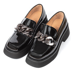 Black Glossy Leather Women Shoes with metal chain on white background with shadow