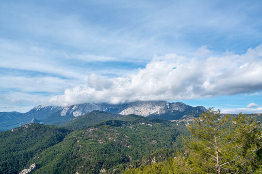 The identification of Mnara with Marmara has generally been accepted at the site of Kavak Daği where it extends over the top and slopes at 1350 m, behind Kemer.