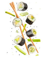 Sushi rolls and wooden chopsticks flying on white background © New Africa