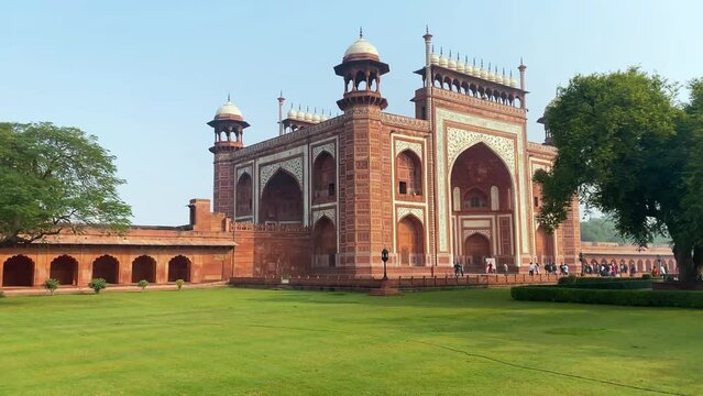 Agra, Uttar Pradesh, India - 12.15.2022: Taj Mahal, Agra, India. Tourists visiting a popular tourist attraction.