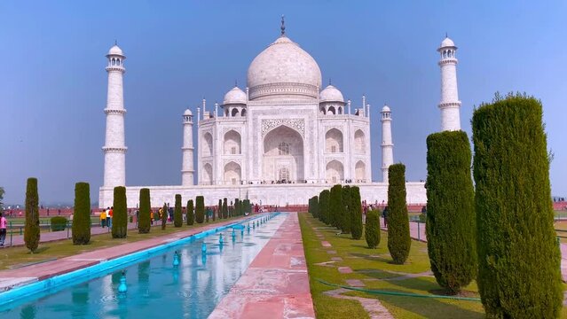 Agra, Uttar Pradesh, India - 12.15.2022: Taj Mahal, Agra, India. Tourists visiting a popular tourist attraction.