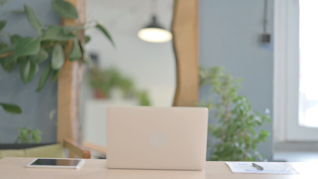 African Man Coming Back To Office For Working On Laptop