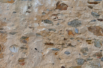 Traditional stone and adobe wall in the countryside.