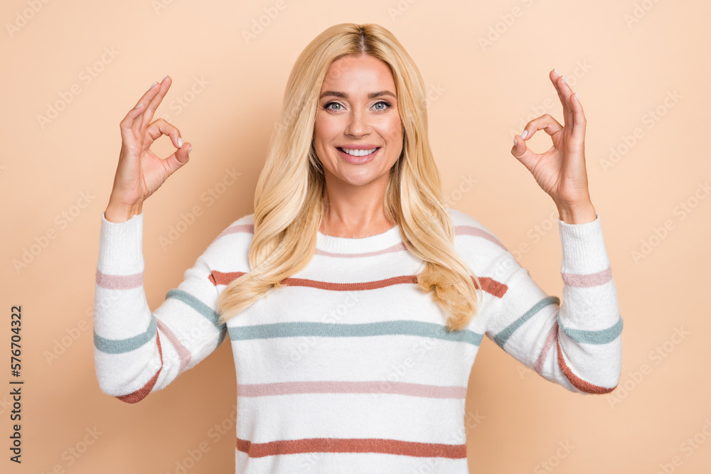 Canvas Prints Portrait of cheerful satisfied pretty girl wavy hairdo wear striped pullover showing okey nice job isolated on pastel color background