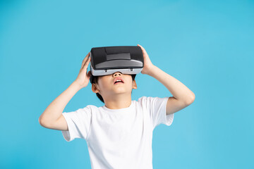 Asian boy portrait on blue background