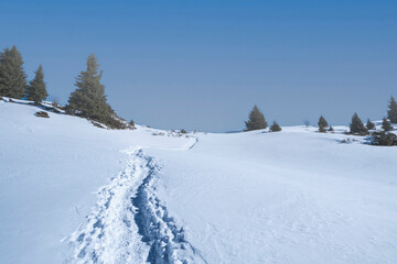 Winter landscape high in the mountains. Deep snow and mountains.