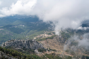 The identification of Mnara with Marmara has generally been accepted at the site of Kavak Daği where it extends over the top and slopes at 1350 m, behind Kemer.