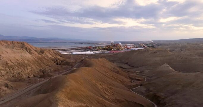 Aerial footage of the Dead Sea factories near the mountains of Sodom and the Amiaz plain in the south of the Dead Sea. Filmed in C4K Apple ProRes 422 HQ