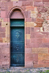 Side portal of the Imperial Cathedral of St. Peter in the city of Worms, Rhineland-Palatinate, Germany, Europe, a Romanesque masterpiece of the early 12th century, state February 26, 2023.