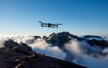 Obraz na płótnie Canvas Drone flying over the mountains.