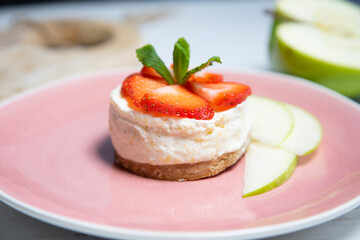 Lemon mousse with red berries. 