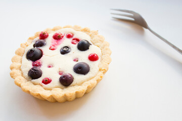 Tartlet with blueberries. Dessert with red fruits such as raspberries, strawberries, blackberries or blueberries.