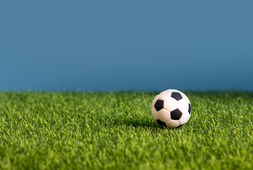 football on green grass , soccer field  