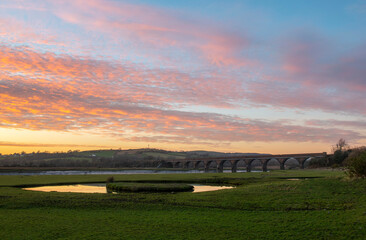 Winter sunset over the Eleven Arches Viaduct, in Hendy, Swansea, South Wales