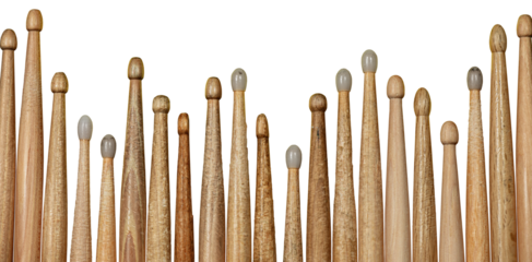 Close-up of a large group of used wooden drumsticks isolated on white or transparent background. Percussion instrument. Png.