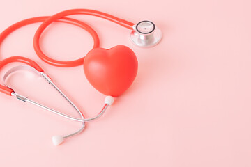 Red heart with doctor physician's stethoscope, World heart health day, doctor day.