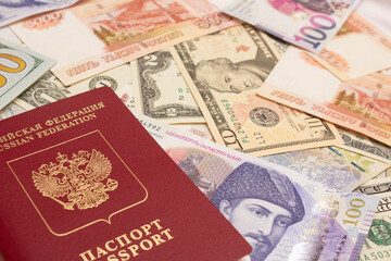 Russian biometric passport. Cash paper notes. Georgian lari. 100 GEL. American dollar. 10 USD. USA. 5000 rubles. Money Of Russia. Concept of currency exchange, travel, tourism, immigration. Citizen