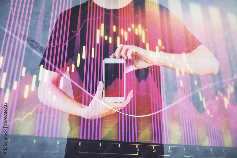 Poster double exposure of man's hands holding and using a digital device and forex graph drawing. financial
