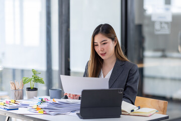 Business Documents, Auditor businesswoman checking searching document legal prepare paperwork or report for analysis TAX time,accountant Documents data contract partner deal in workplace office	