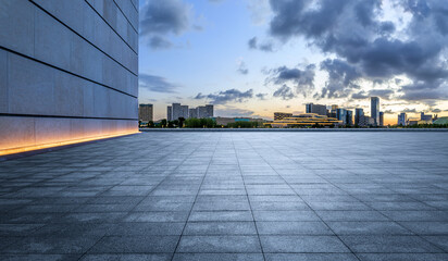 Empty square floor and wall with modern city skyline in Ningbo, Zhejiang Province, China.